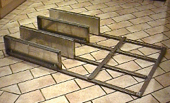 Side view of chassis with axle brackets bolted on