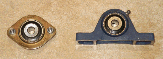 Pressed steel bearing versus cast iron mounted bearing