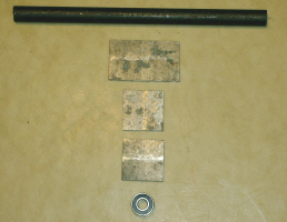 metal for idler shaft and bearing support block
