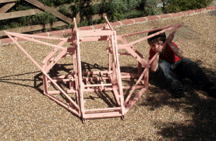 Painted Hog chassis with a small boy lurking under its ear