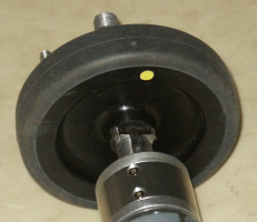 Shaft locked to motor and trolley wheel