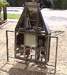 The hog in its cradle, sitting on its bum