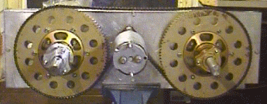 Sprocket chain and motor on one axle side bracket