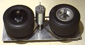 Wheels, motor, sprocket, chain, and axle bracket